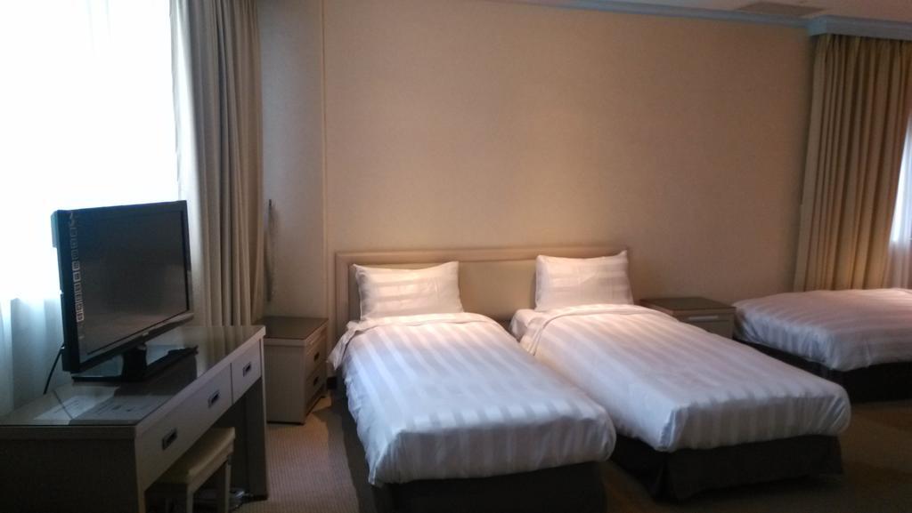 A Casa Hotel Taoyuan Room photo